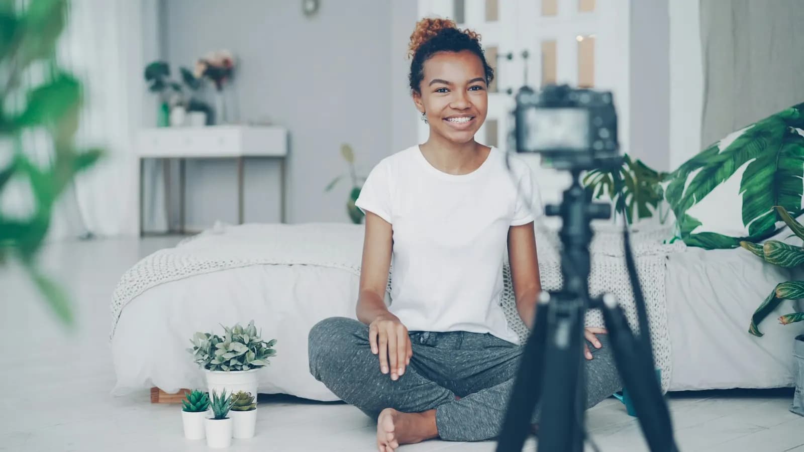 Content creator filming a video at home