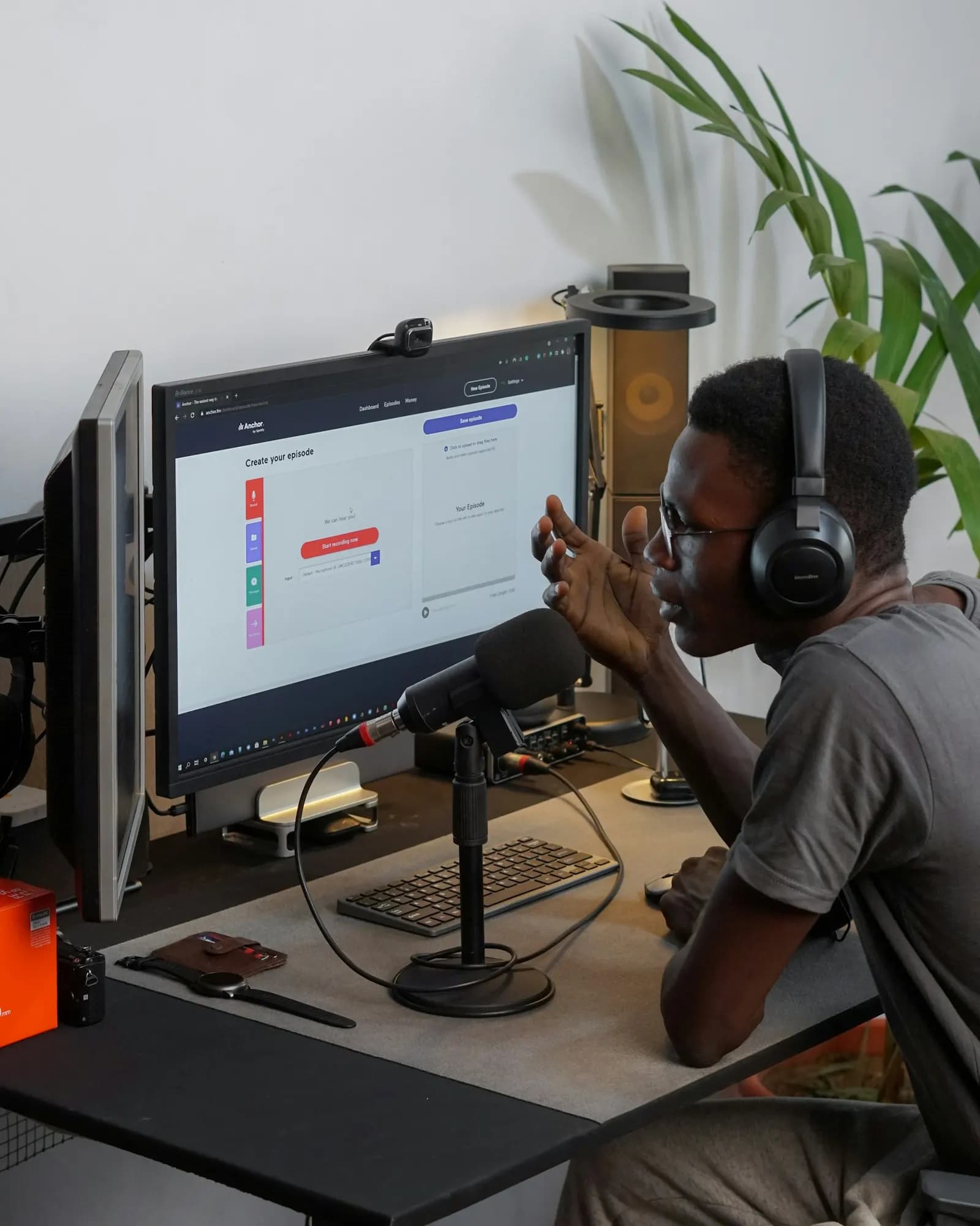 Creator with headphones working on a campaign dashboard